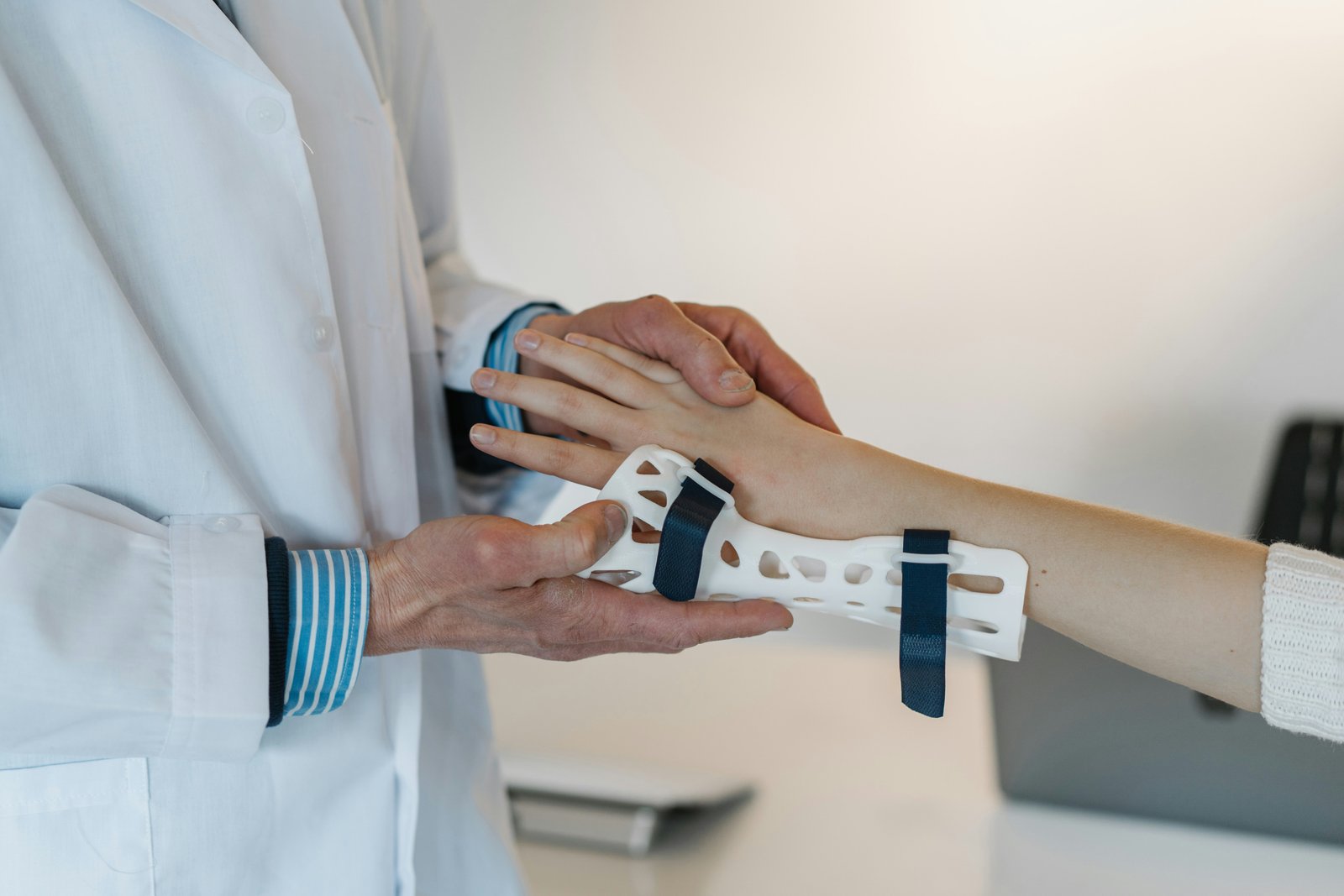 Orthopaedic surgeon reviewing a knee joint X-ray